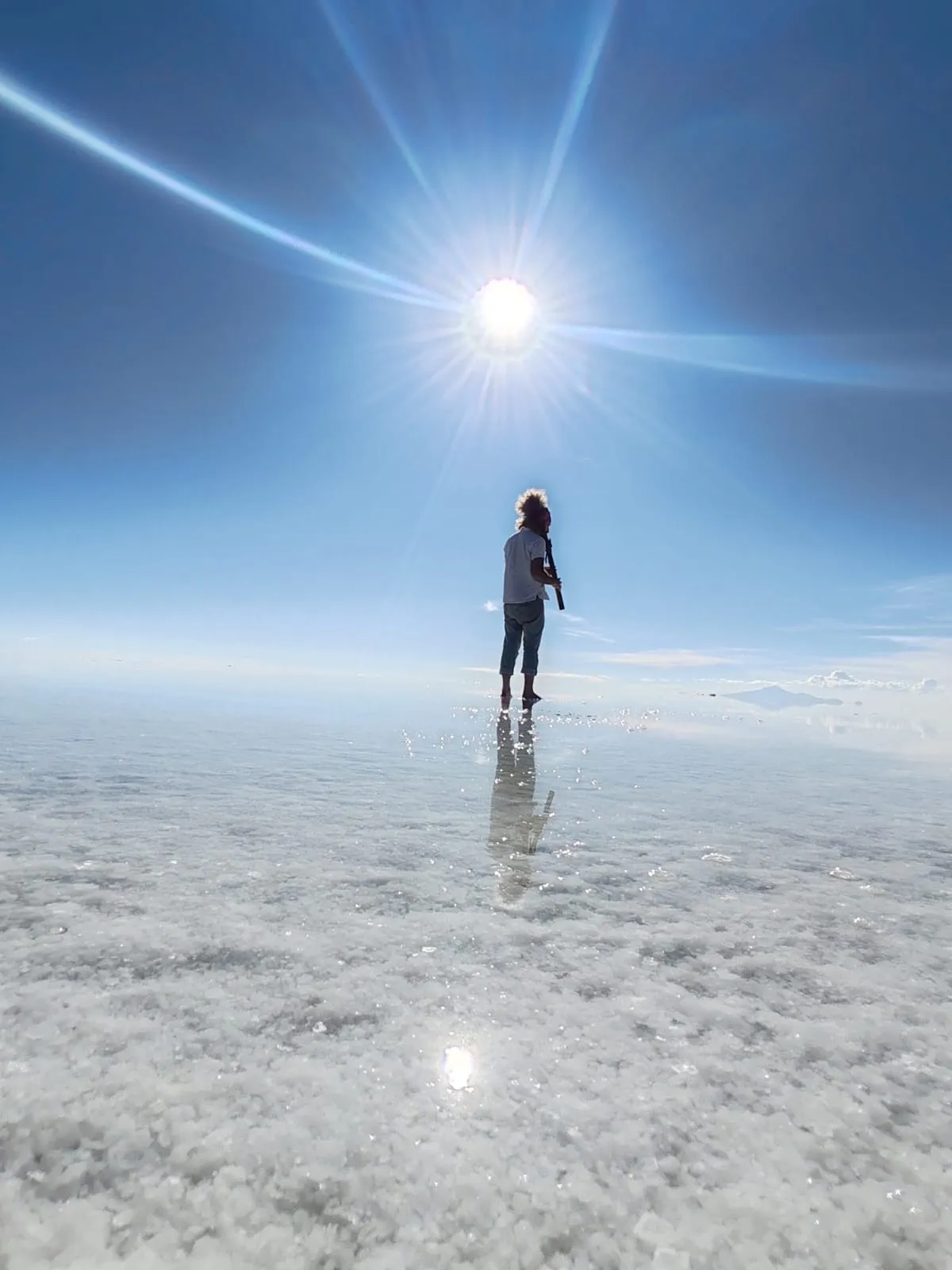 Jicarai walking toward the sun